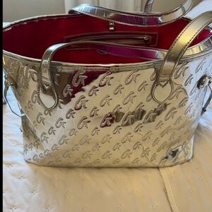 Elegant Silver Tote Bag with Red Interior